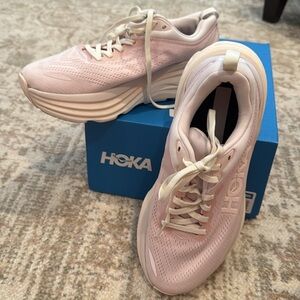 Hoka Women's Light Pink Bondi 8 athletic shoes. Size 8B.